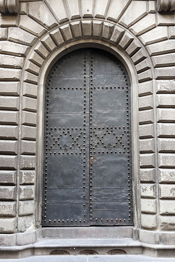 Photo 15015: Formed, black double door with metal plates and nails