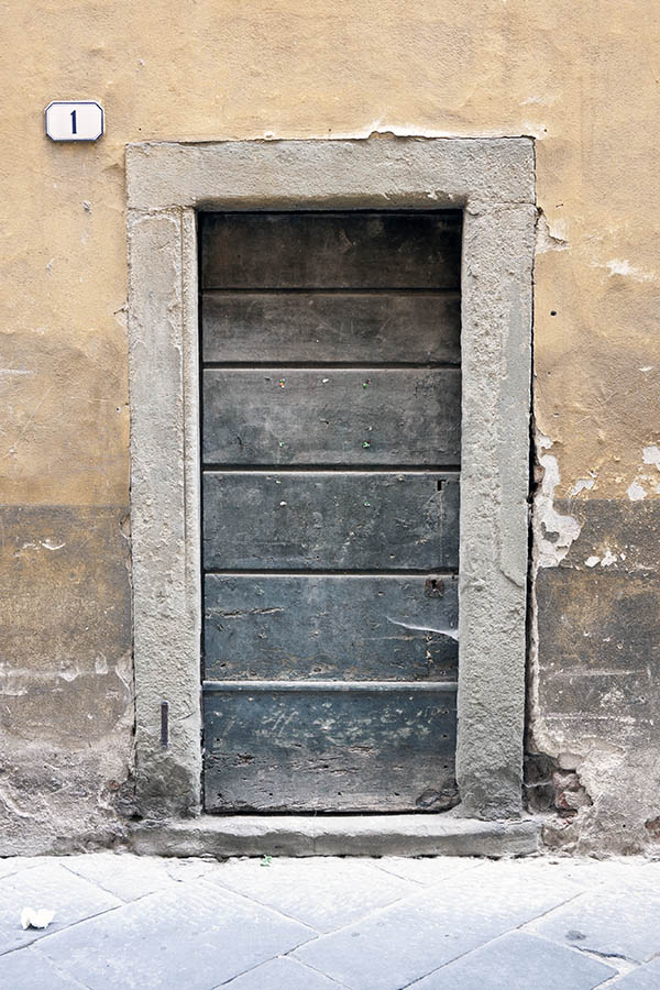 Photo 15066: Decayed, unpainted, black door made of planks