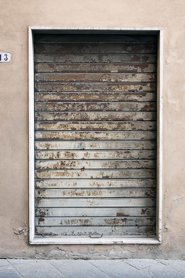 Photo 15112: Worn, grey security shutter