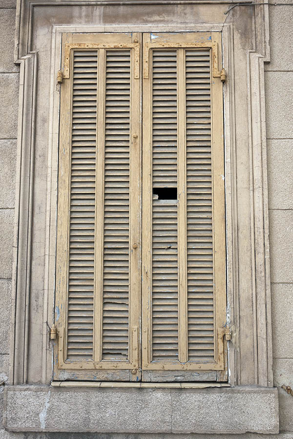 Photo 15282: Decayed, narrow, light yellow shutters
