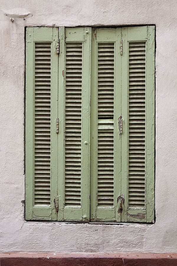 Photo 15440: Worn, light green folding shutters