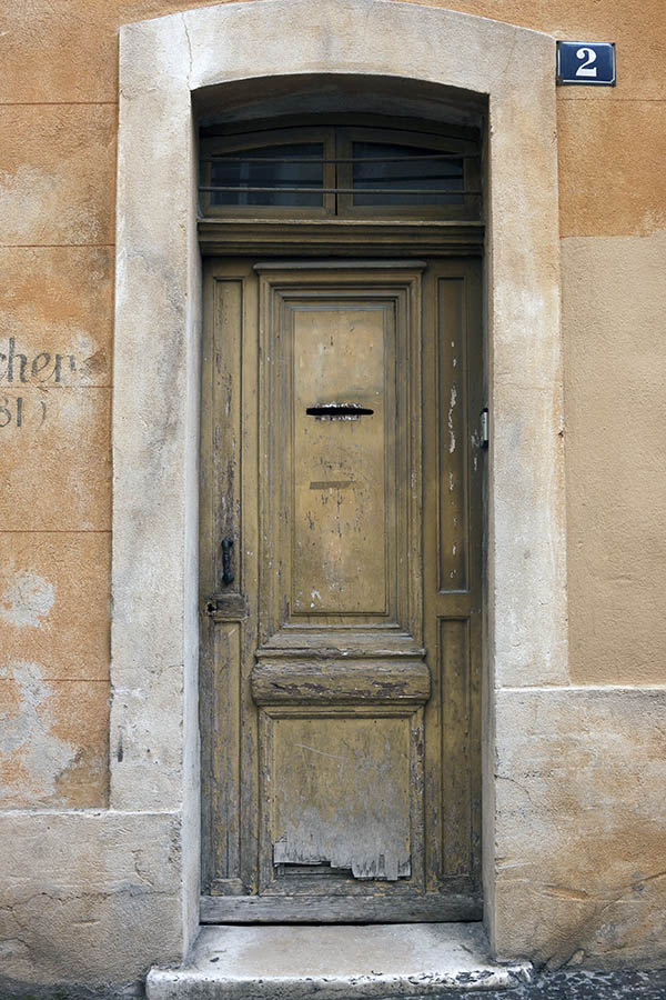Photo 15464: Decayed, panelled, unpainted, light green and yellow door with barred fan light