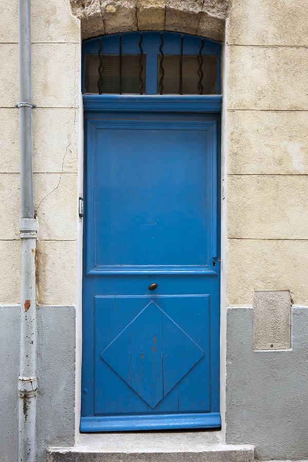 Photo 15469: Panelled, blue door with barred fan light