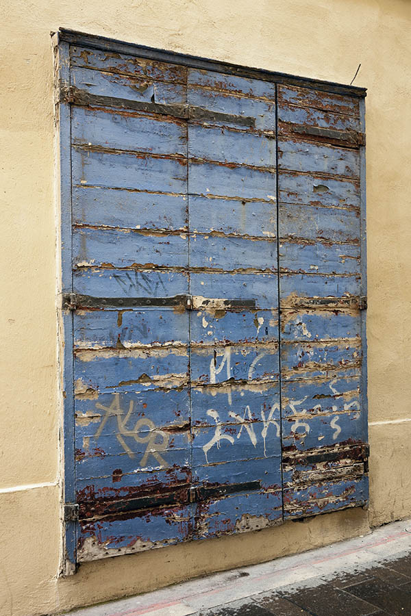 Photo 15477: Decayed, teal folding double door made of planks