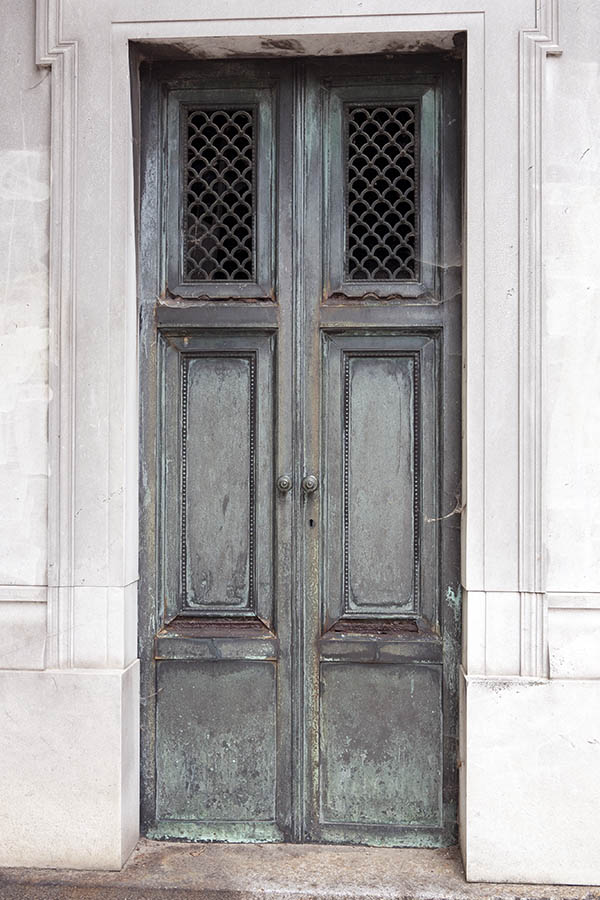 Photo 15604: Decayed, teal metal double door with latticed door lights