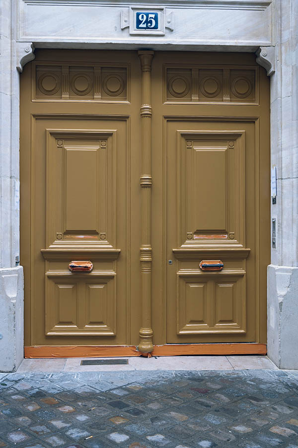 Photo 15630: Carved, panelled, light brown gate with minor door