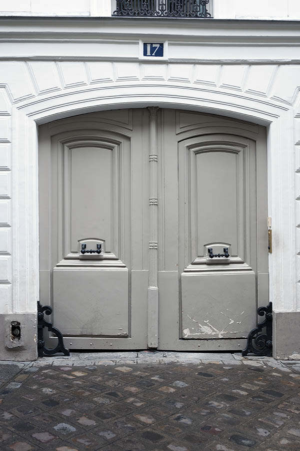 Photo 15632: Worn, formed, carved, panelled, light grey gate with minor doors