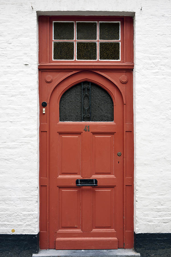 Photo 15698: Formed, panelled, red door with top window and formed, latticed door light