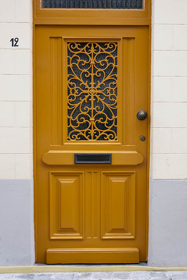 Photo 15794: Panelled, dark yellow door with top window and latticed door light