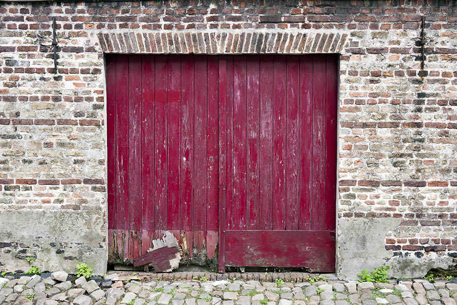 Photo 15848: Decayed, cerise red gate made of planks