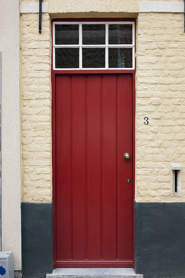 Photo 15942: Red door made of planks with red and white top window