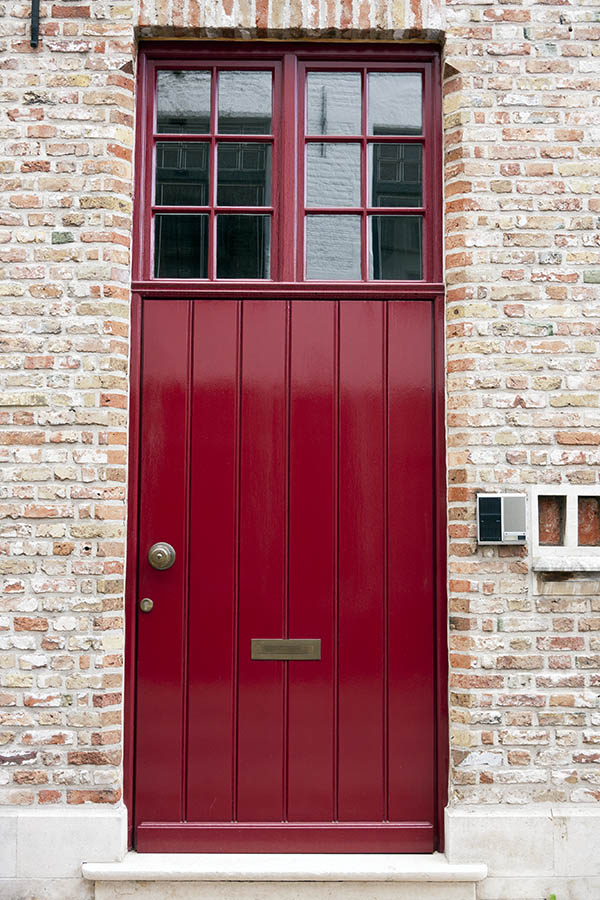 Photo 16050: Red door made of planks with top window