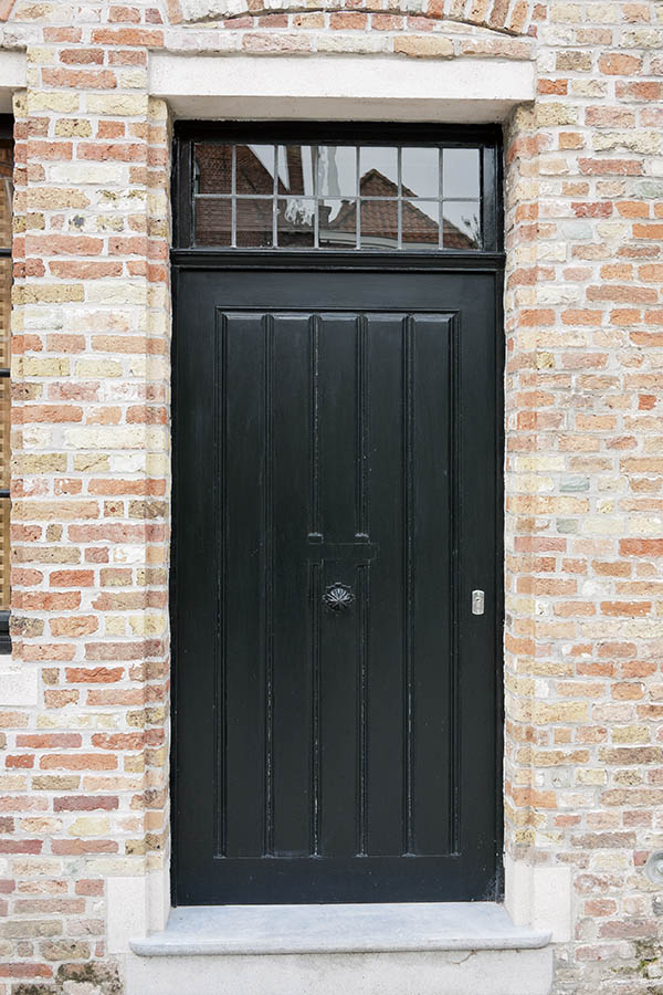 Photo 16074: Panelled, black door with top window