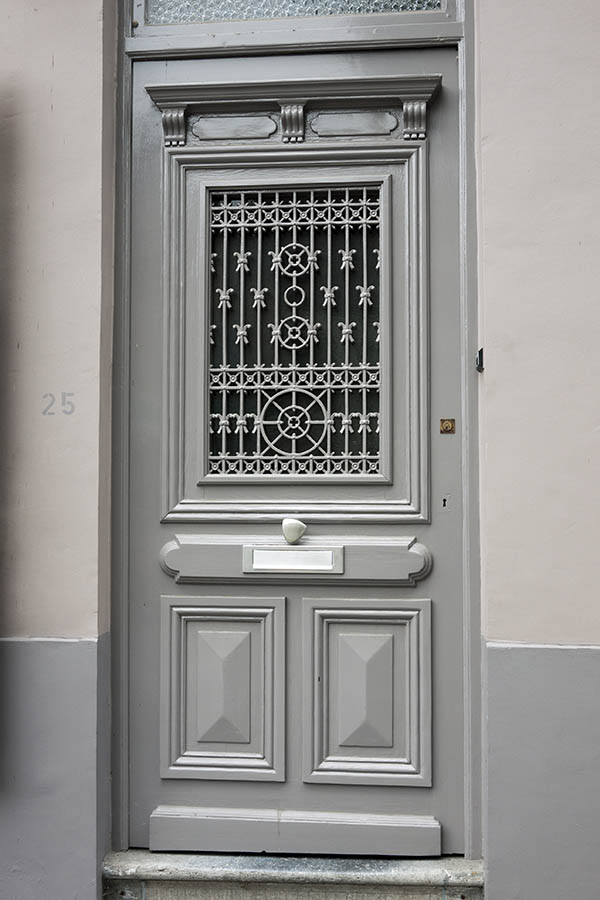 Photo 16099: Panelled, carved, grey door with top window and door light