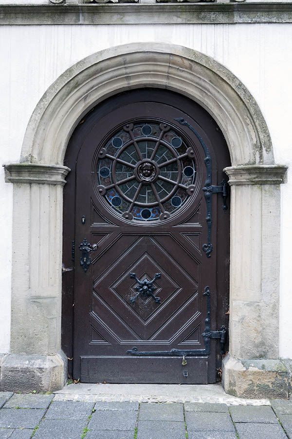 Photo 16275: Formed, panelled, brown door with round door light