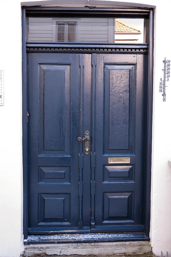 Photo 16791: Panelled, carved, blue double door with top window