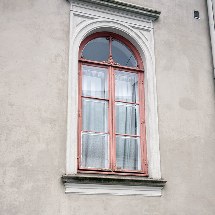Photo 16842: Formed, light pink window with three frames and eight panes