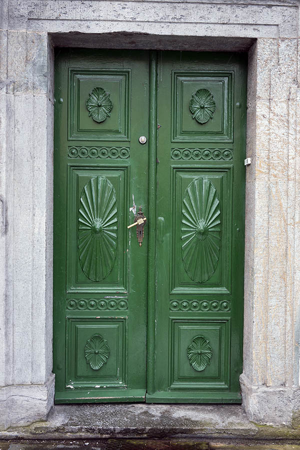 Photo 16844: Panelled, carved, green double door