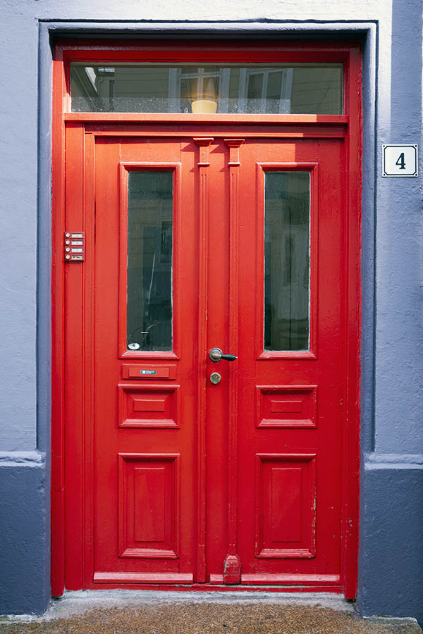 Photo 16854: Panelled, crimson red double door with top window