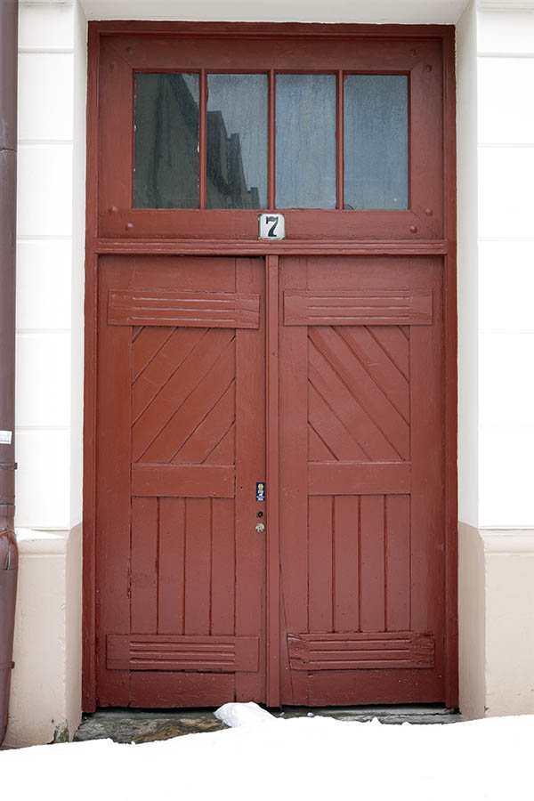 Photo 17050: Lopsided, panelled, brown double door with top window in Art Nouveau style