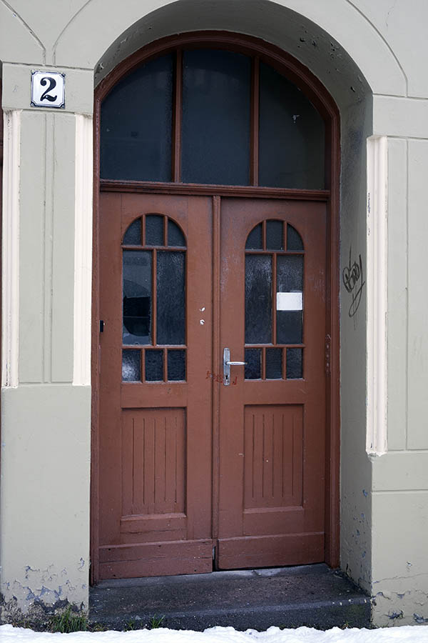 Photo 17122: Formed, panelled, brown double door with fan light