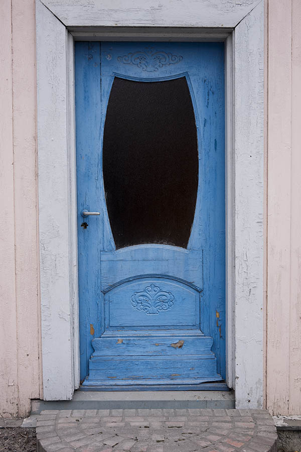 Photo 17195: Worn, formed, panelled, carved, blue door with door light