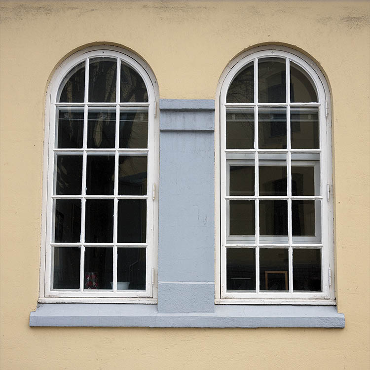 Photo 17600: Two formed, white windows with 15 panes each