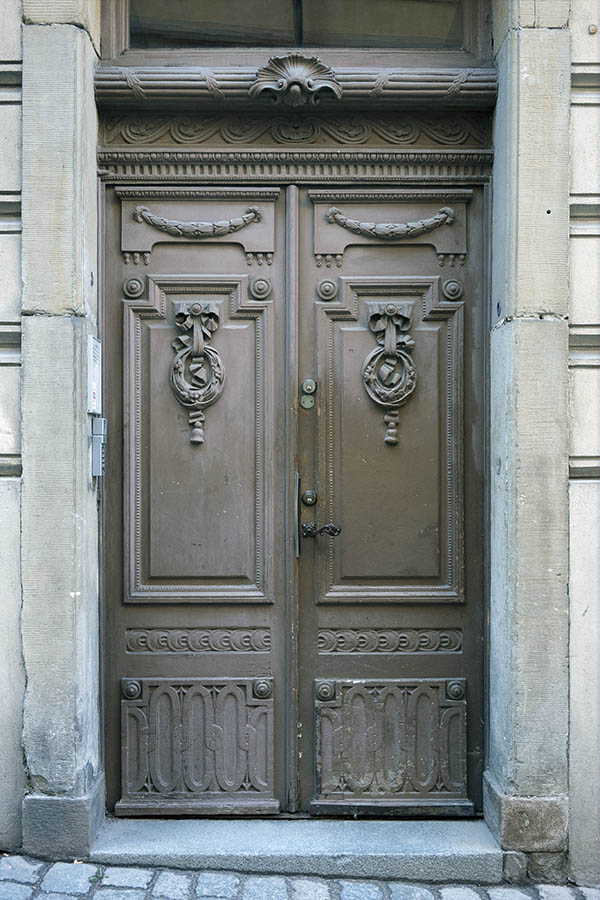 Photo 17642: Panelled, carved, brown double door 