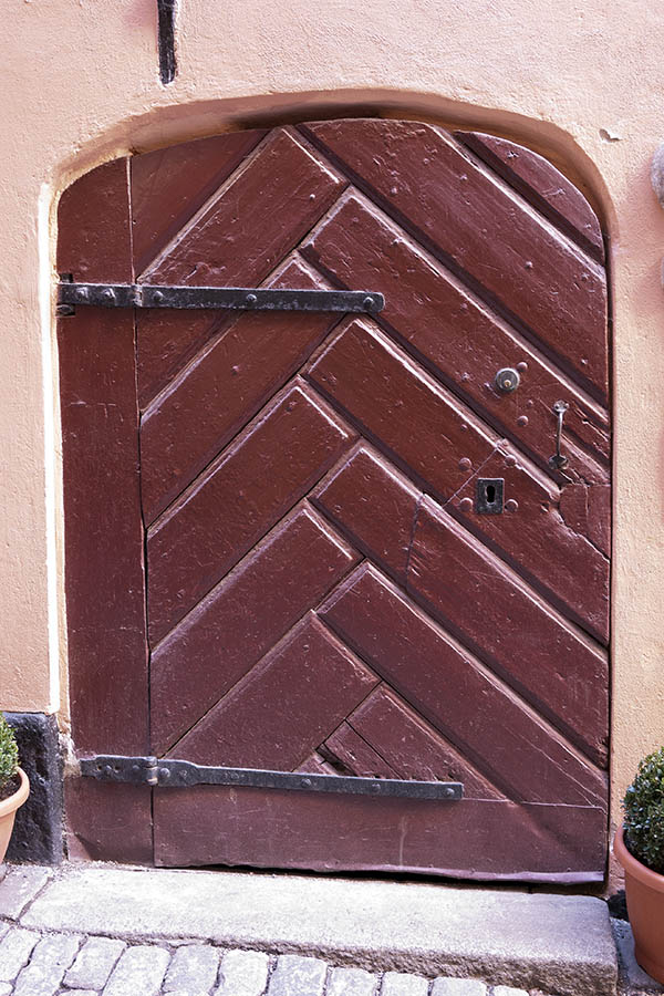 Photo 17742: Formed, red door of diagonally mounted boards