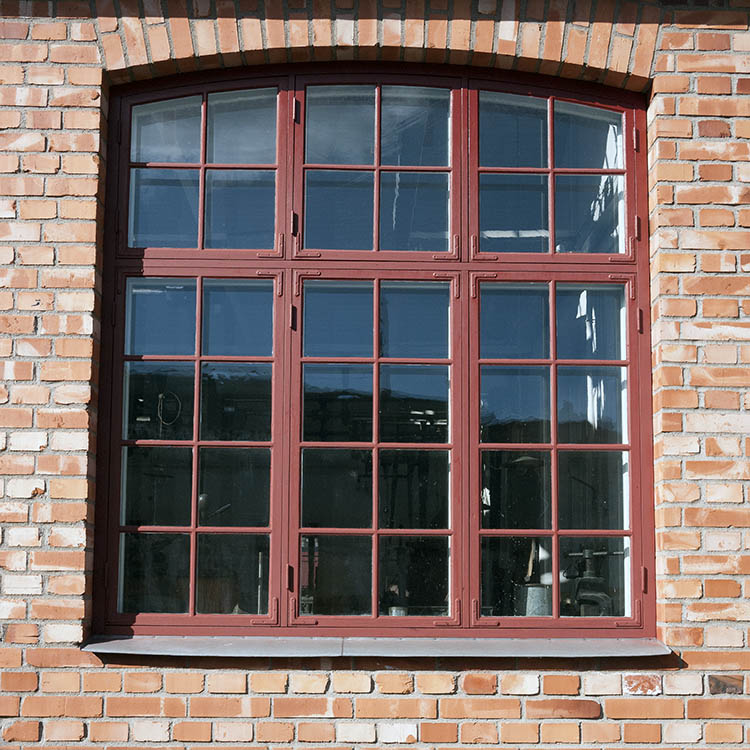 Photo 17955: Large, formed, brown window with six frames and 36 panes