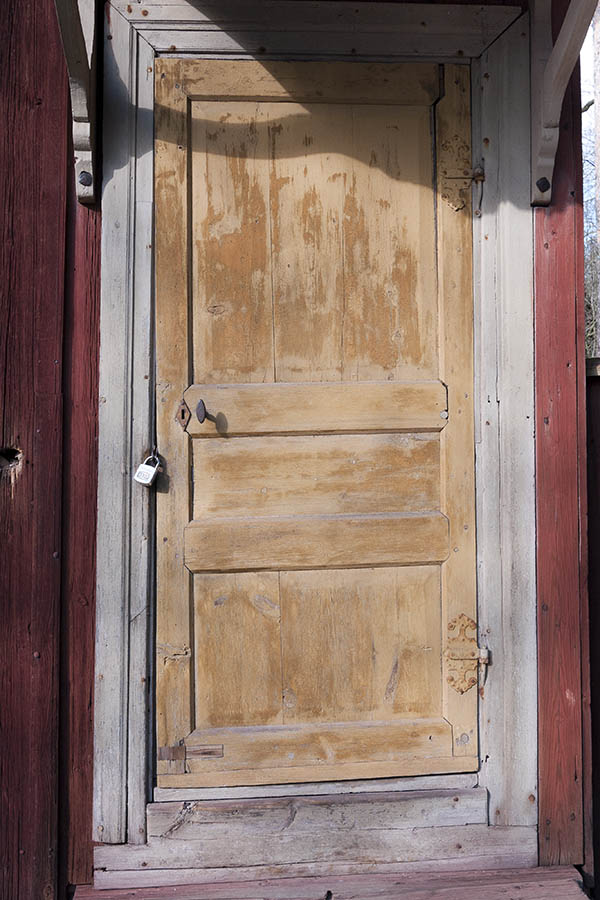 Photo 18057: Panelled, yellow and unpainted door in a grey frame