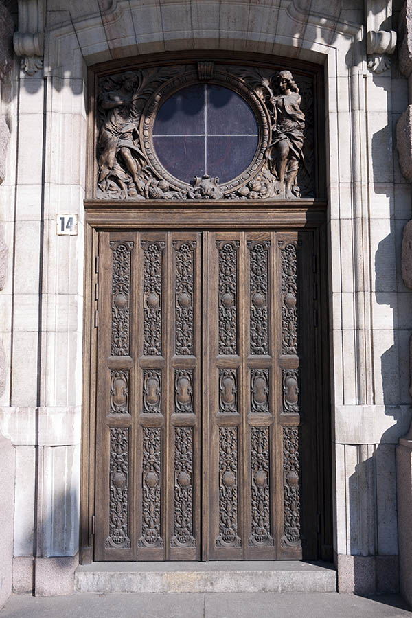 Photo 18132: Panelled, carved, brown double door with formed, round top window