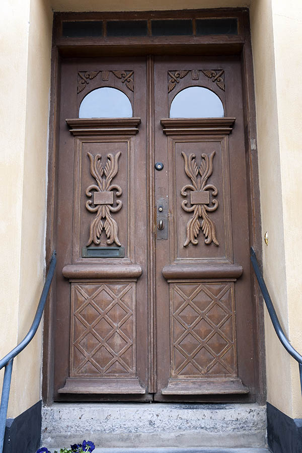 Photo 18658: Carved, panelled, brown double door with formed door lights and top window