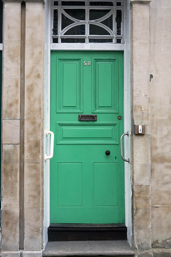 Photo 18757: Panelled, green door with top window in a white frame