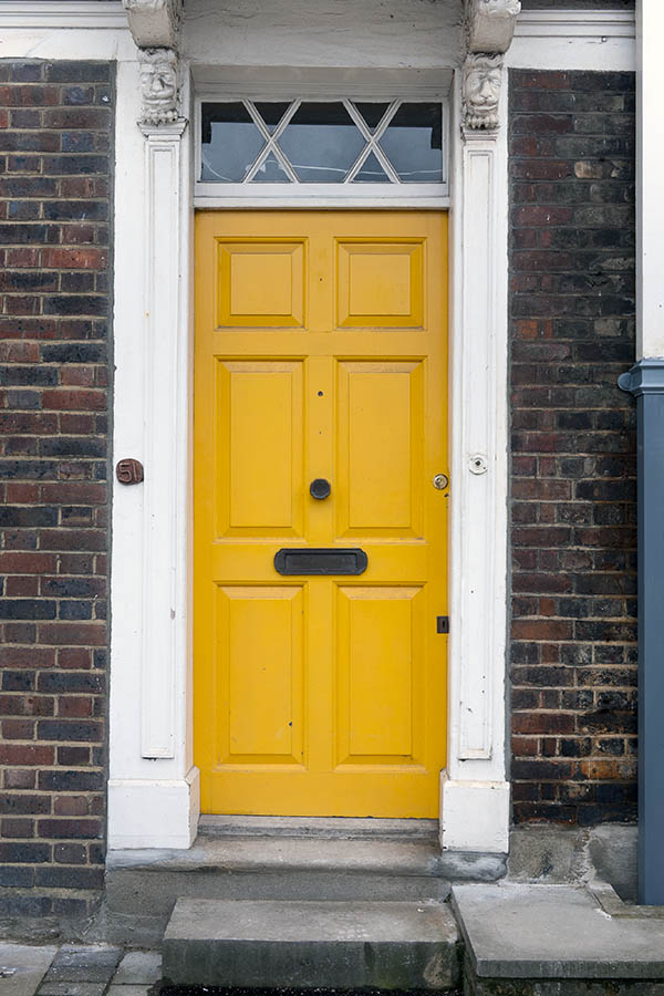 Photo 18914: Panelled, yellow door with white top window and white pilaster