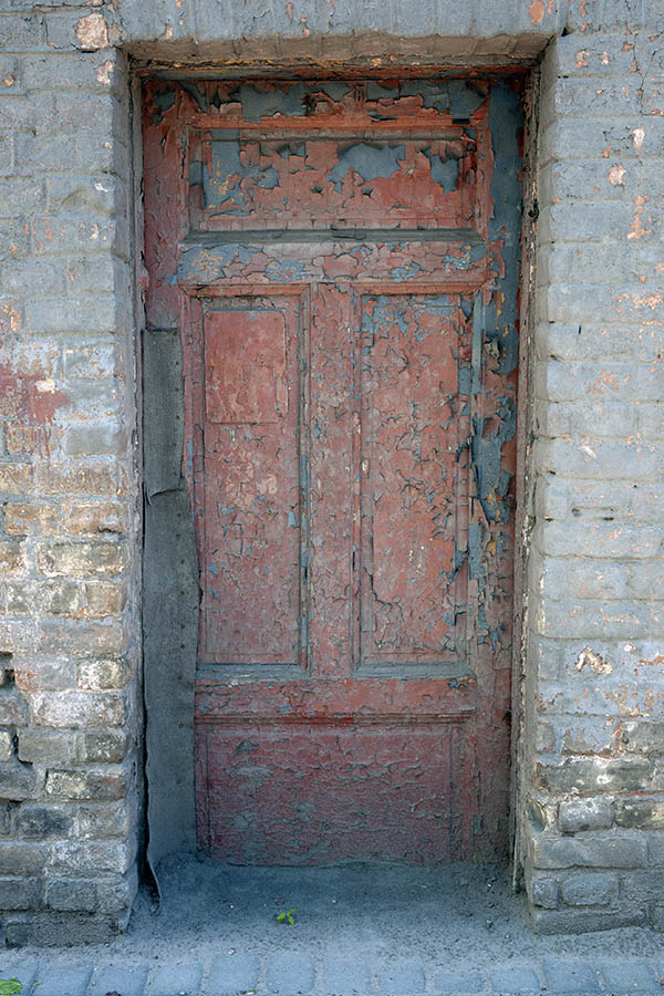 Photo 19592: Decayed, panelled, red and blue door