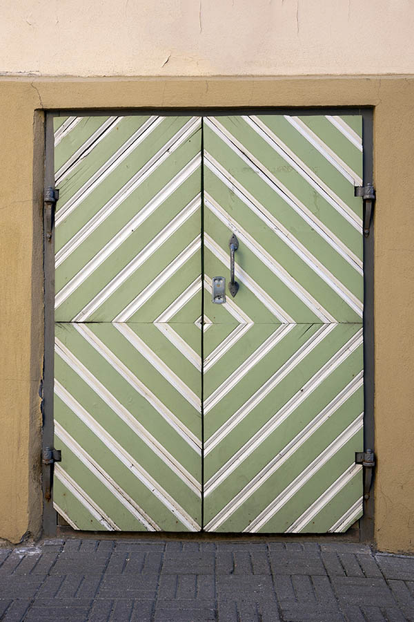 Photo 19824: White and light green double door of diagonally mounted boards