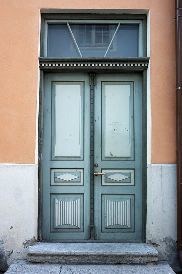 Photo 19903: Panelled, carved, teal and turquoise double door with top window