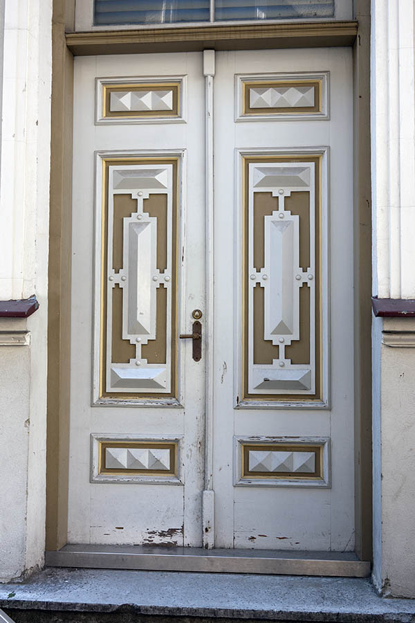 Photo 19974: Panelled, white, grey and light brown double door with top window