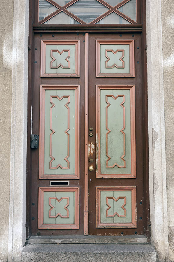 Photo 19976: Worn, carved, panelled, brown, pink and grey double door