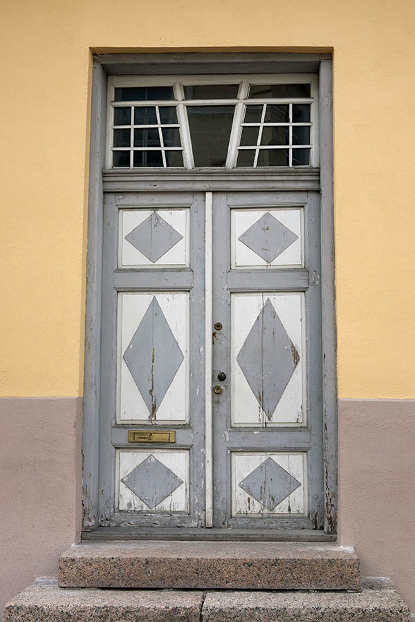 Photo 20140: Worn, panelled, grey and white double door with top window