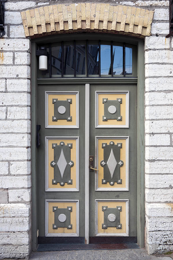Photo 20237: Panelled, carved, grey, white and yellow double door with a black fan light
