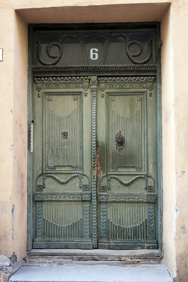 Photo 20248: Worn, panelled, carved, green double door with top window