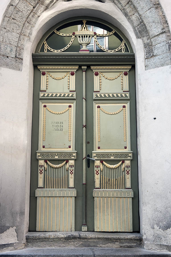 Photo 20273: Large, panelled, carved, green, light green yellow and red double door with fan light