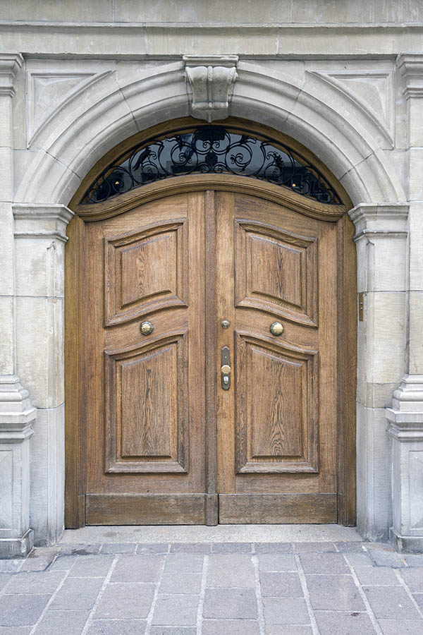 Photo 23820: Formed, panelled, oiled double door with door knobs and latticed fan light
