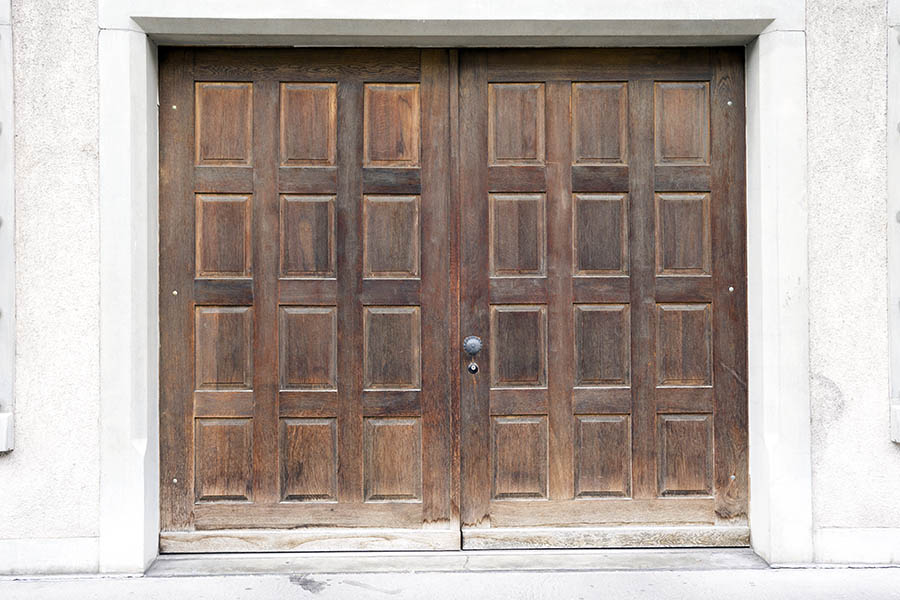 Photo 23830: Worn, panelled, oiled double door with 24 panes