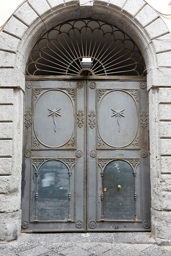 Photo 23938: Large, grey metal gate with cast-iron details and latticed fan light