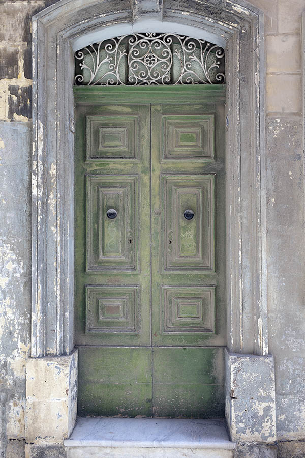 Photo 24126: Worn, panelled, light green double door with latticed fan light