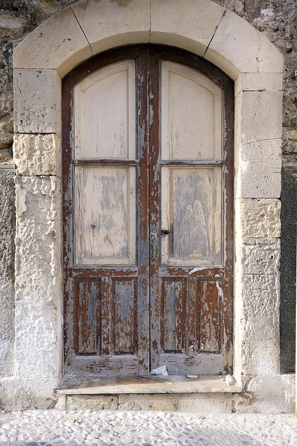 Photo 24412: Decayed, formed, red and unpainted double door with four panes