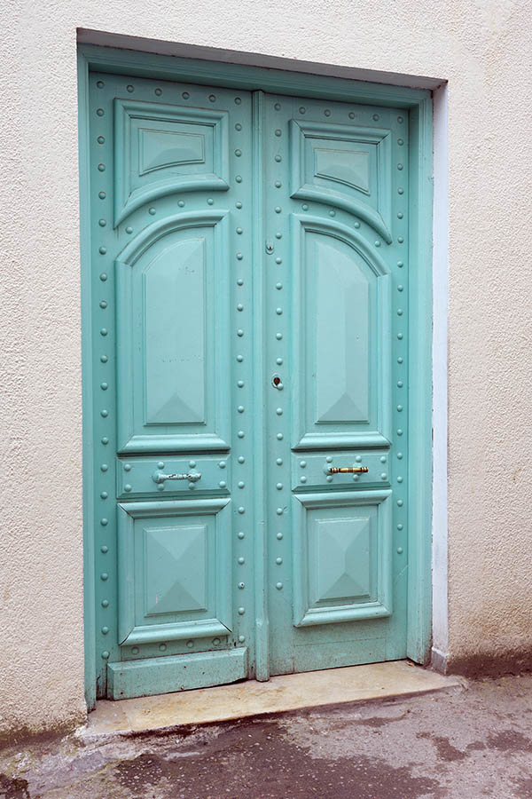 Photo 24520: Panelled, light green double door with nails